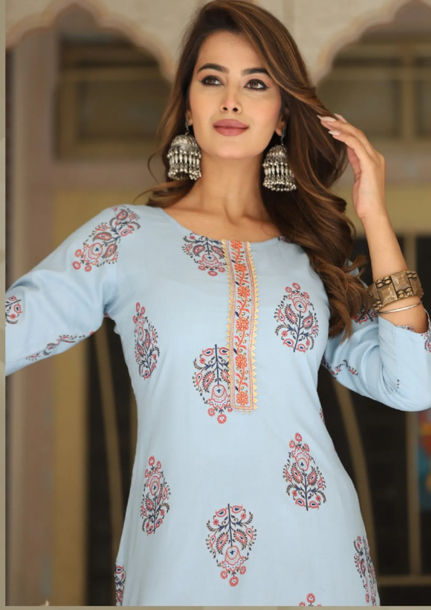 Appealing Blue Color Rayon Gold print With Embroidery Work Kurti For Women