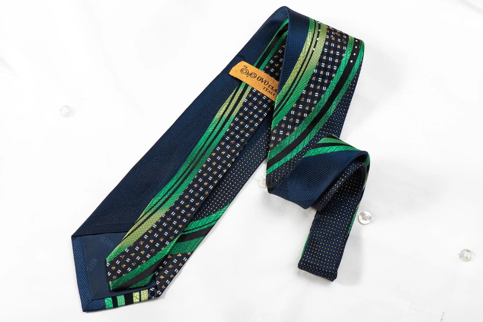 OVO-Classic Mens Silk Necktie Green Waves On Navy With Silver Sparkles