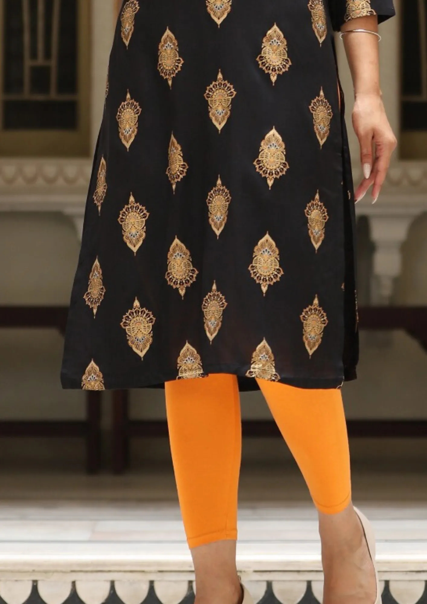 Pretty Black Color Rayon Gold printed Kurti With Fancy Embroidery Work